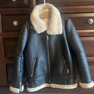 Zara Leather coat with beige fur interior.